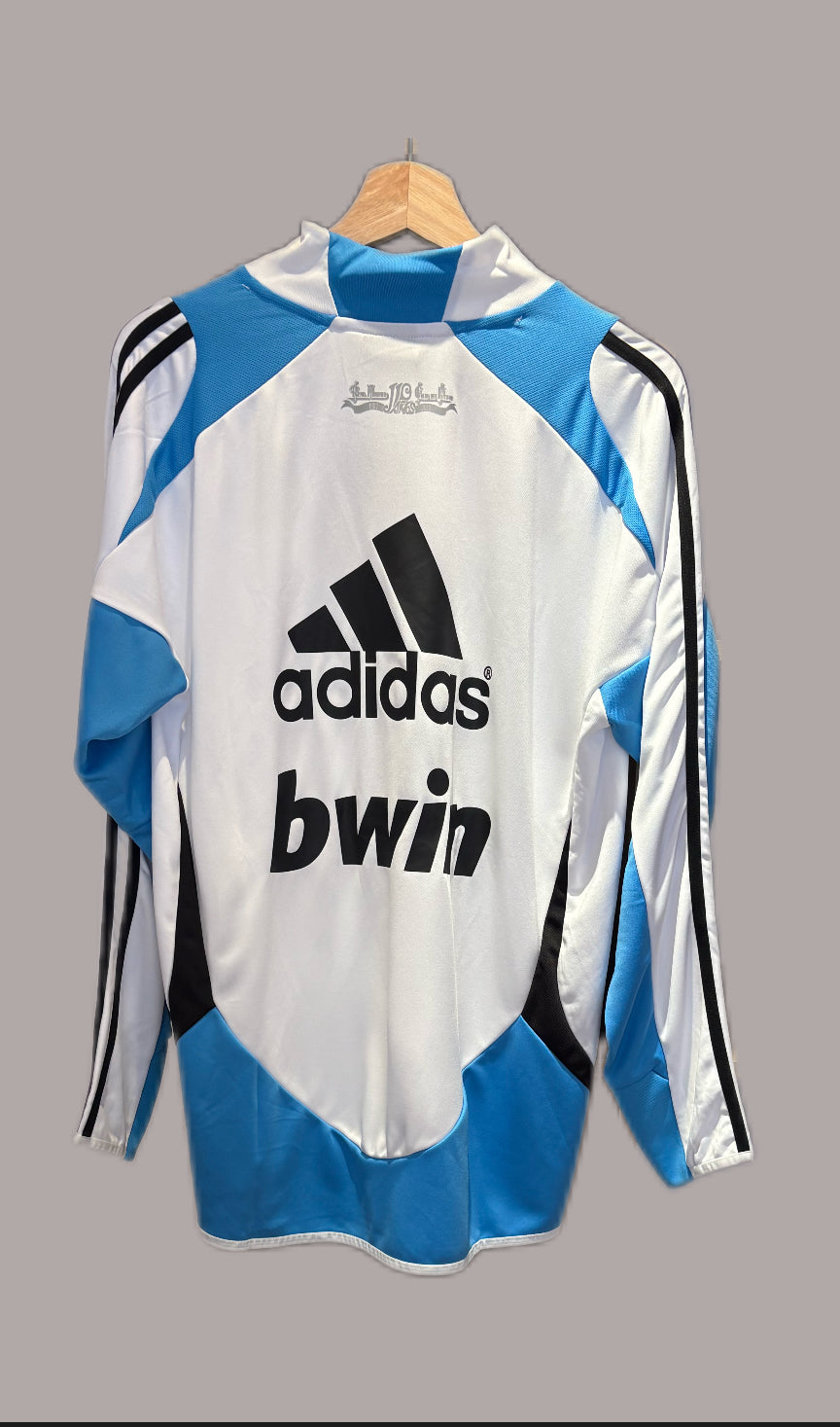 Vintage Real Madrid 2012-2013 long-sleeve football training top.