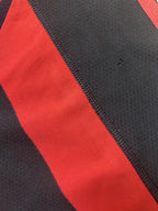 Small pinhole on black stripe
