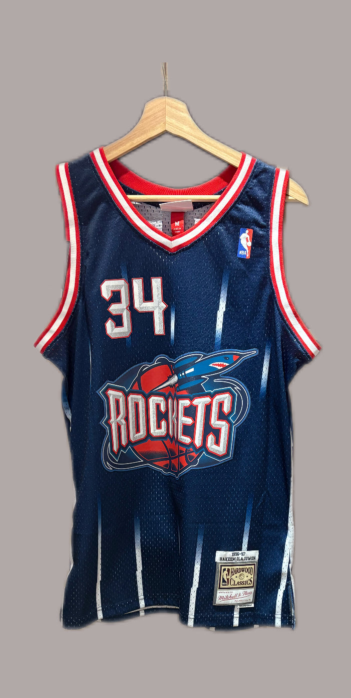 Vintage Hakeem Olajuwon Houston Rockets 1996-97 Hardwood Classics Swingman road jersey in navy blue.
