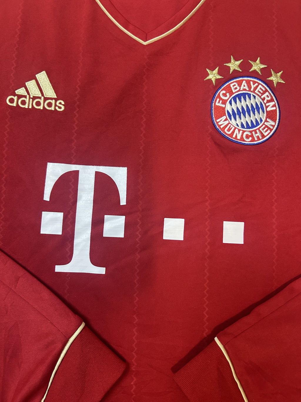 Crest and Adidas logo close-up