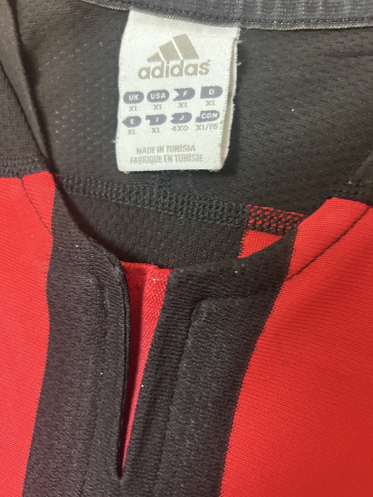 Adidas collar size tag