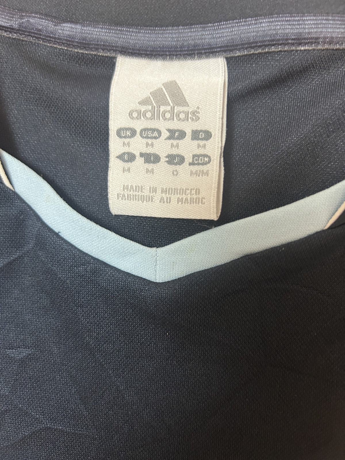 Adidas collar size tag M